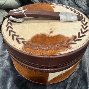 Brown and White Cowhide Round Bag